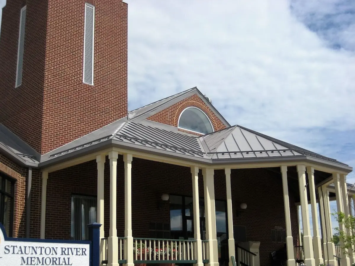 Skilled roofing craftsmen working on a residential roof in Clarksville